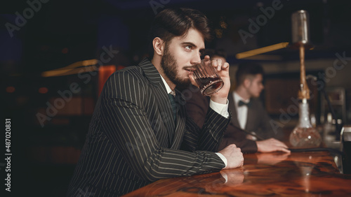 dude sitting in a bar