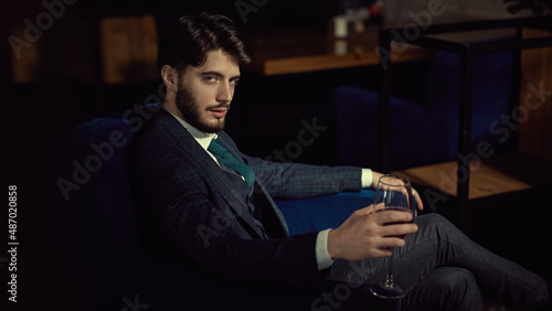 Tableau sur toile respectable man resting in armchair