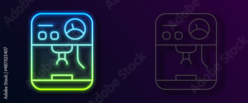 Glowing neon line Coffee machine icon isolated on black background. Vector