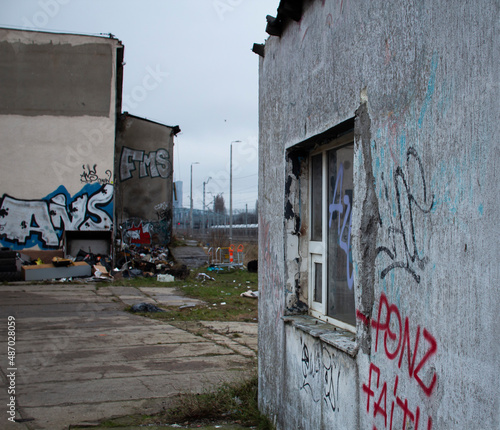 Abandoned buildings with graffiti on walls