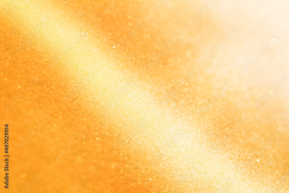 Fototapeta premium Gold celebration glitter lights bokeh background.
