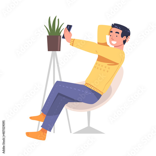 Man Character with Digital Device Sitting in Armchair Suffering from Internet Addiction Vector Illustration