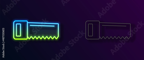 Glowing neon line Hand saw icon isolated on black background. Vector