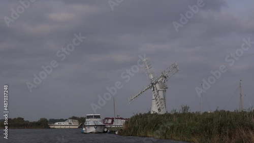 Norfolk East of England with windmills is a favourite boating holiday destination for people UK 4K photo