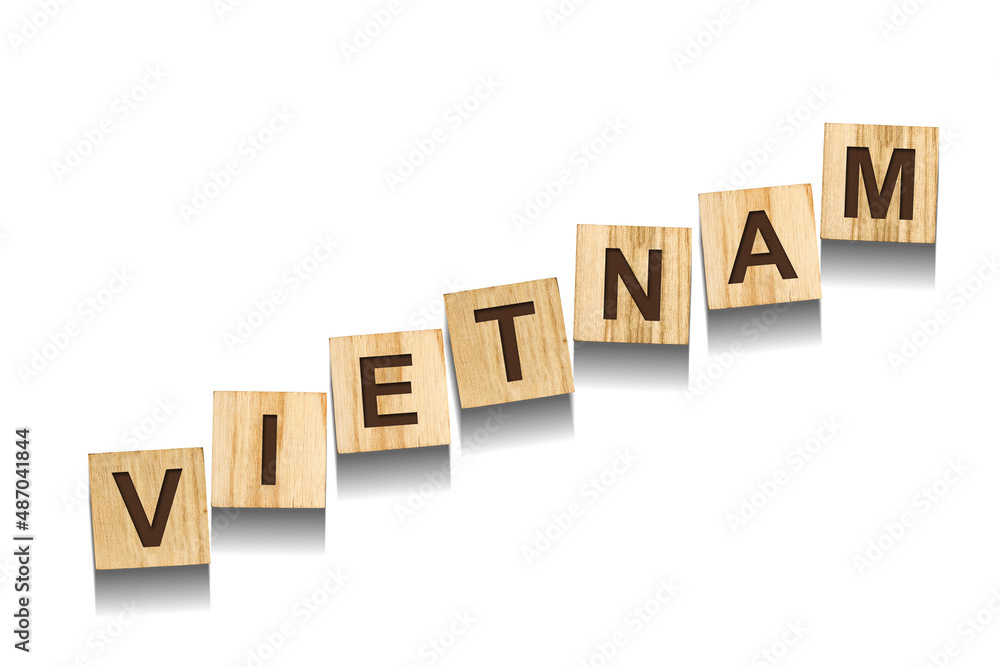 Vietnam, word on wooden blocks. Isolated on a white background. Vietnam, word on wooden blocks. Isolated on a white background.