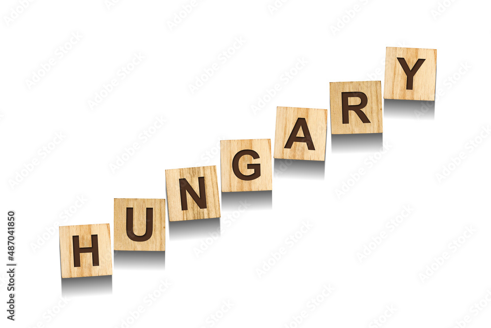 Hungary, word on wooden blocks. Isolated on a white background. Hungary, word on wooden blocks. Isolated on a white background.