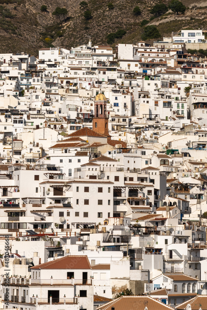 vertical view of a whitewashed village in the hills above Malaga in the Andalusian backcountry