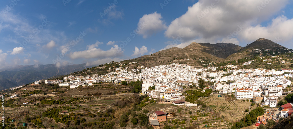 panorama view of a whitewashed village in the hills above Malaga in the Andalusian backcountry