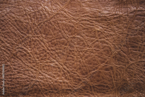 Genuine leather texture background. Dark brown, orange textures for decoration blank. Vintage skin natural suede pattern abstract.