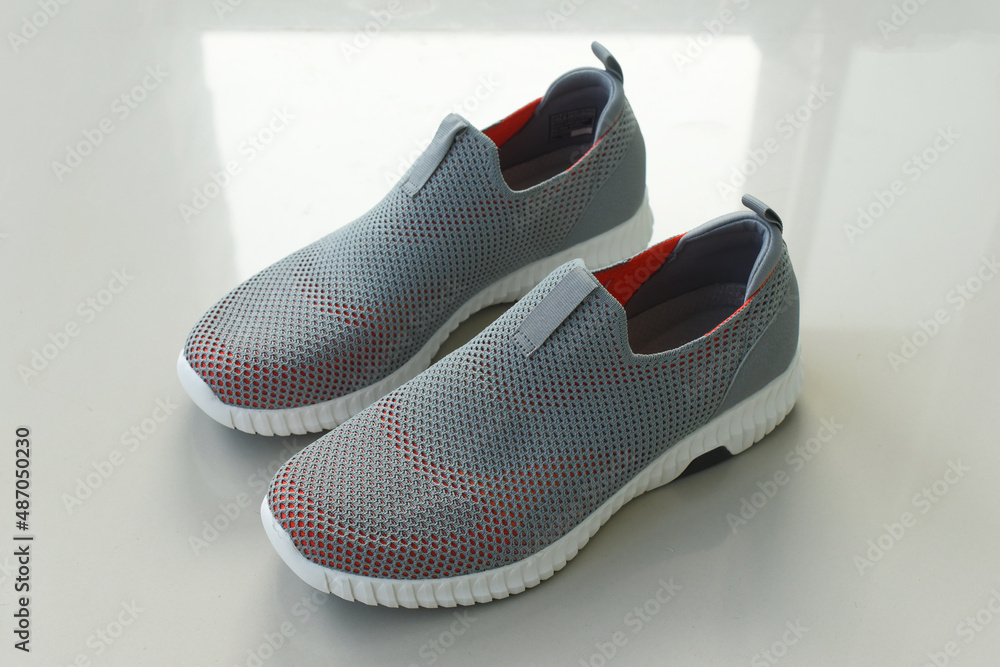 sports style men's shoes on white background. sports style men's shoes on white background.