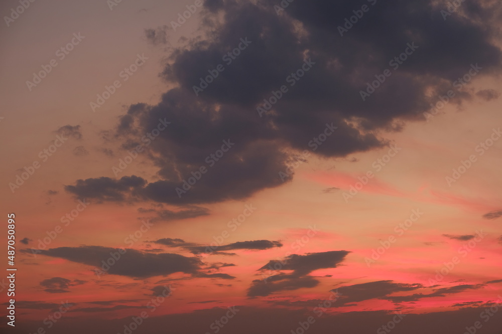 sunset in the sky with clouds