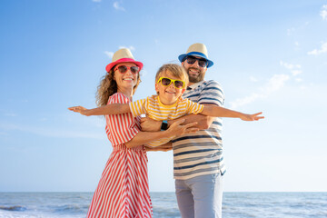 Happy family having fun on summer vacation
