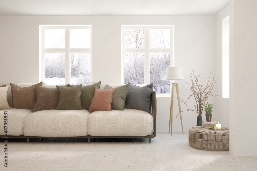 Fototapeta premium White living room with sofa and winter landscape in window. Scandinavian interior design. 3D illustration