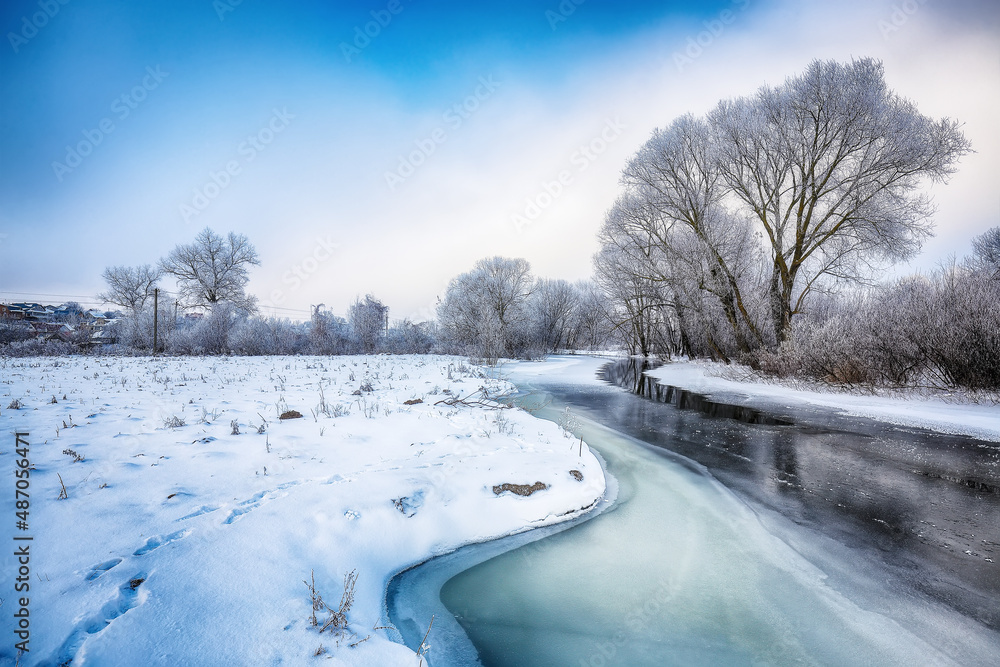 Beautiful Winter landscape scene background with snow covered trees and ice river. Beautiful Winter landscape scene background with snow covered trees and ice river.