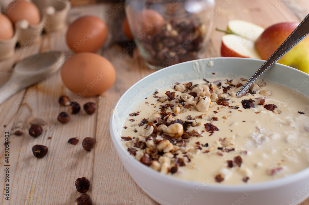 Warm curd dish for breakfast cooked with quark, egg yolk , sweetener and apples. Served with roasted hazelnuts Warm curd dish for breakfast cooked with quark, egg yolk , sweetener and apples. Served with roasted hazelnuts