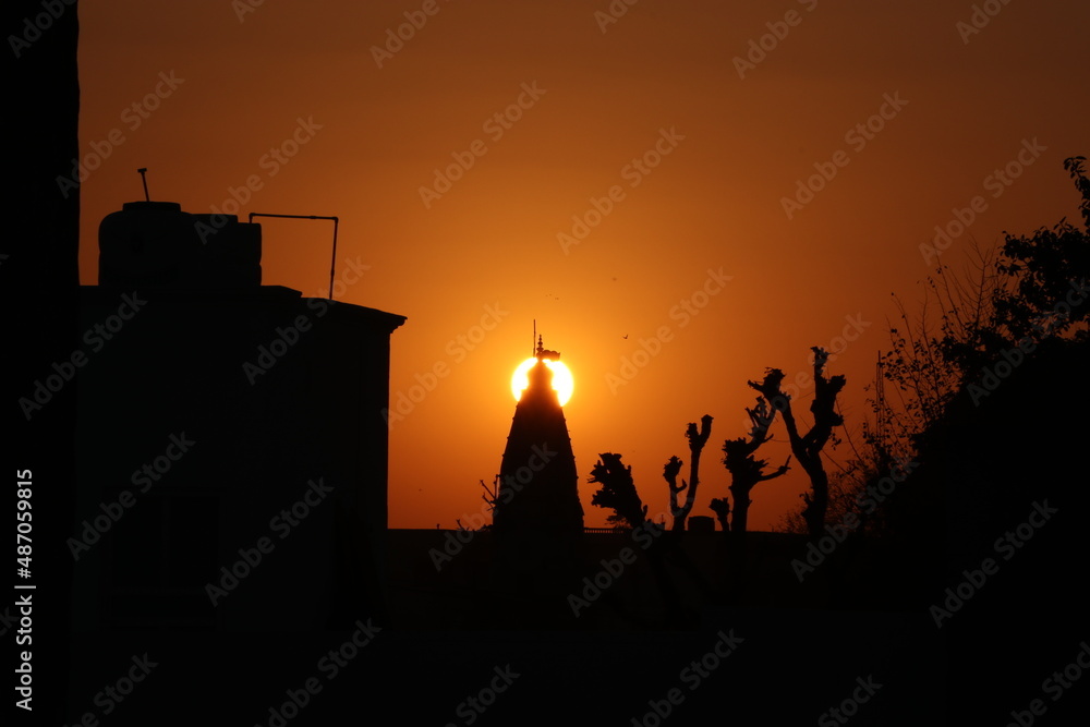 sunset behind the temple.