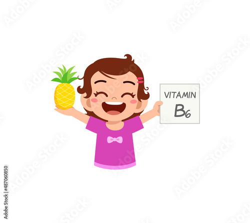 cute little girl holding fruit and vitamin card