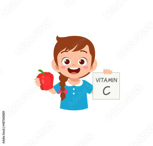 cute little girl holding fruit and vitamin card