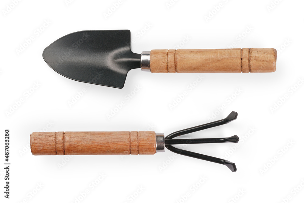 Small shovel and rake isolated with clipping path