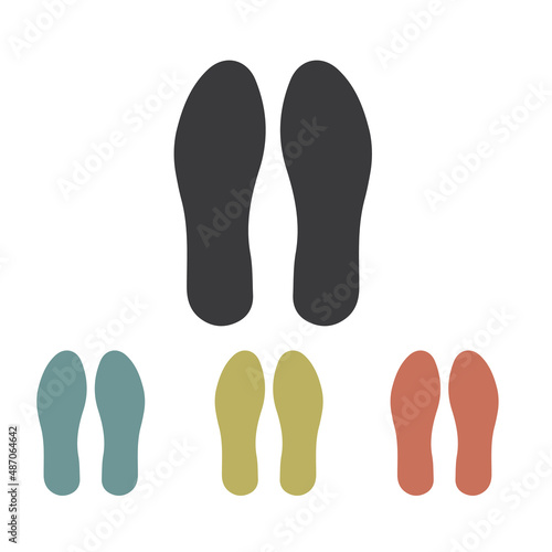 Orthopedic insoles for shoes in different colors (yellow, blue, red).