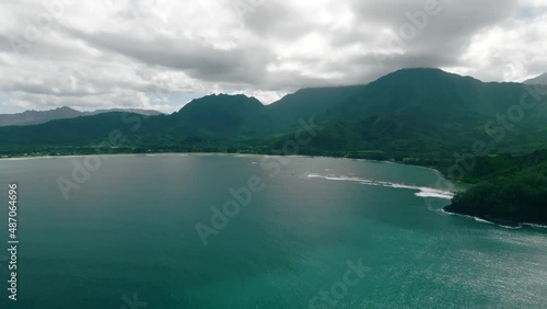 Hanalei bay and Halelea forest reserve on background, in Kauai island, Hawaii. Aerial view photo