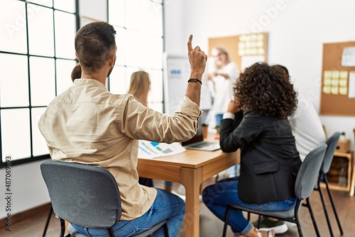 Group of business workers listening boss conference during meeting at the office.