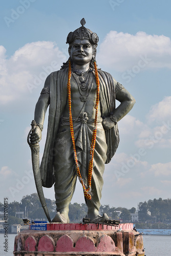 Vertical view of Raja Bhoj Statue - 32 feet high, on Upper Lake, King Bhoj, who ruled from about 1010 to 1060, VIP Road,  Bhopal, Madhya Pradesh, India. photo