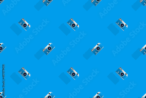 Seamless pattern from old cameras .Background on the theme of photography and photographic equipment. 