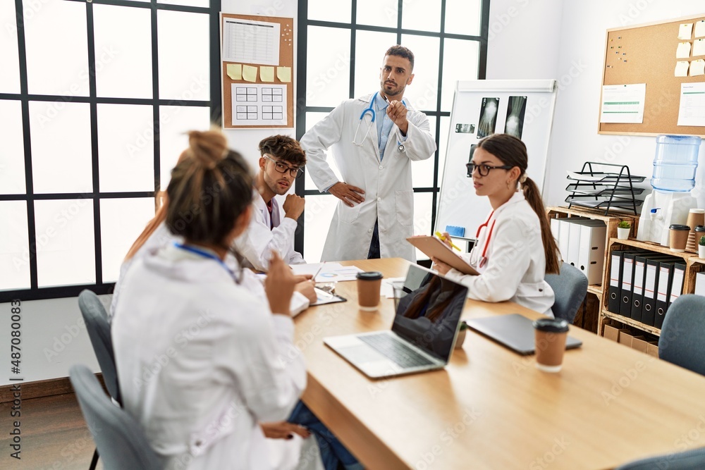 Group of young doctor discussing in a medical meeting at the clinic office. Group of young doctor discussing in a medical meeting at the clinic office.