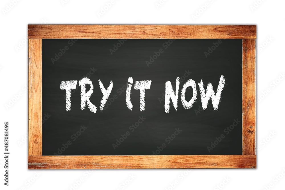 TRY IT NOW text written on wooden frame school blackboard. TRY IT NOW text written on wooden frame school blackboard.