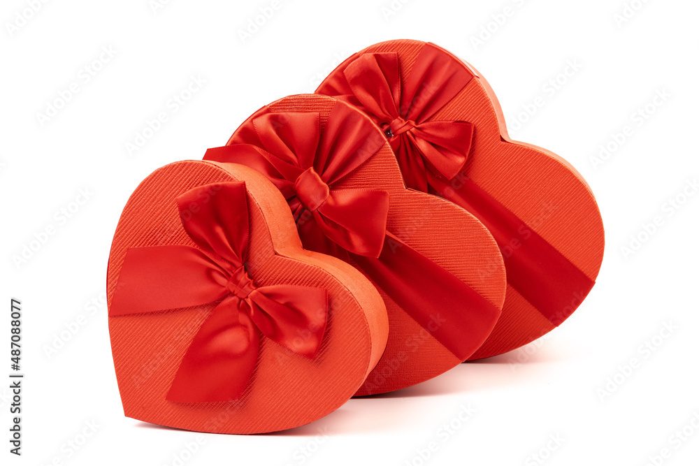 Red box in shape of heart. Gift box for Valentine's Day. Isolated on white background. Red box in shape of heart. Gift box for Valentine's Day. Isolated on white background.