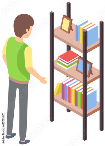 Man standing near shelf with photo frames and books searching for book on bookshelf at home or library. Young person student in bookstore interior, concept of training, education cartoon vector