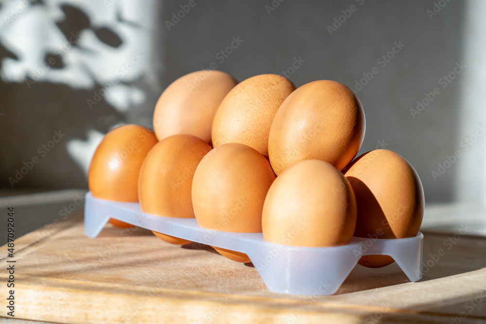 brown chicken eggs in a tray brown chicken eggs in a tray