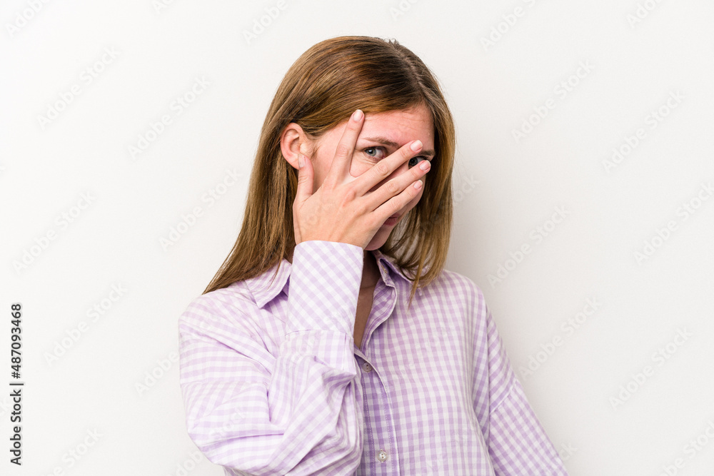 blink at the camera through fingers, embarrassed covering face. blink at the camera through fingers, embarrassed covering face.
