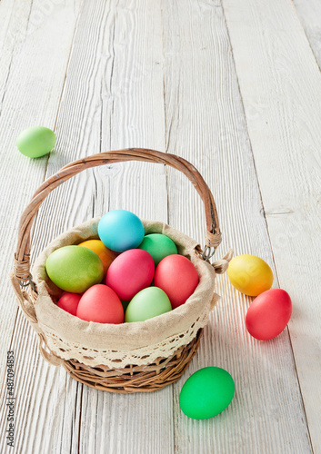 Basket full with colorful Easter eggs