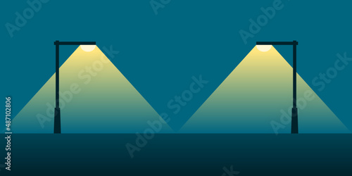 Streetlight lamp poles illumination in night time on dark blue background shadow silhouette flat icon vector design. photo