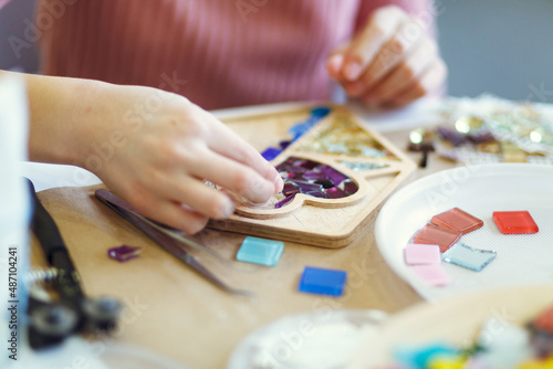 The process of creating a mosaic envelope. 