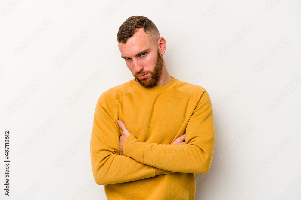 Young caucasian man isolated on white background who is bored, fatigued and need a relax day. Young caucasian man isolated on white background who is bored, fatigued and need a relax day.