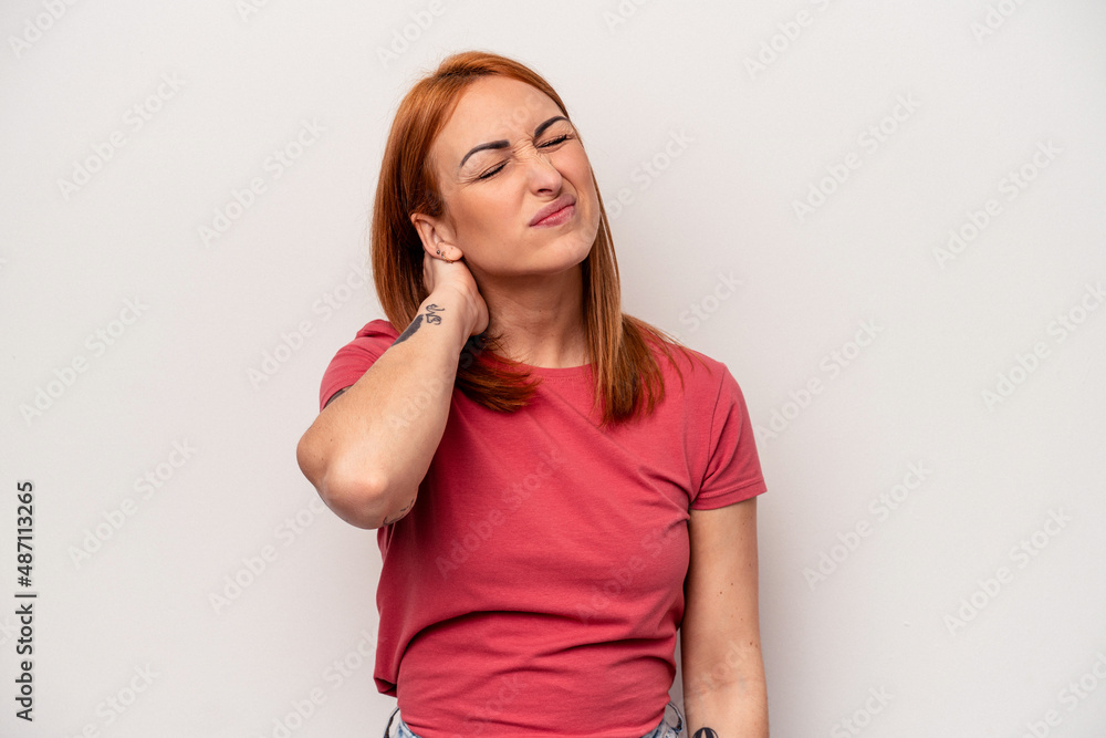 Young caucasian woman isolated on white background suffering neck pain due to sedentary lifestyle. Young caucasian woman isolated on white background suffering neck pain due to sedentary lifestyle.