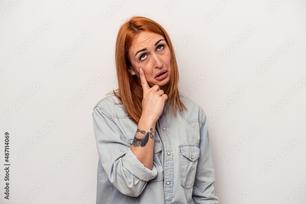 Young caucasian woman isolated on white background crying, unhappy with something, agony and confusion concept. Young caucasian woman isolated on white background crying, unhappy with something, agony and confusion concept.