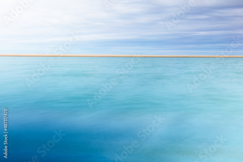 abstract seascape blue water and sky longexposure