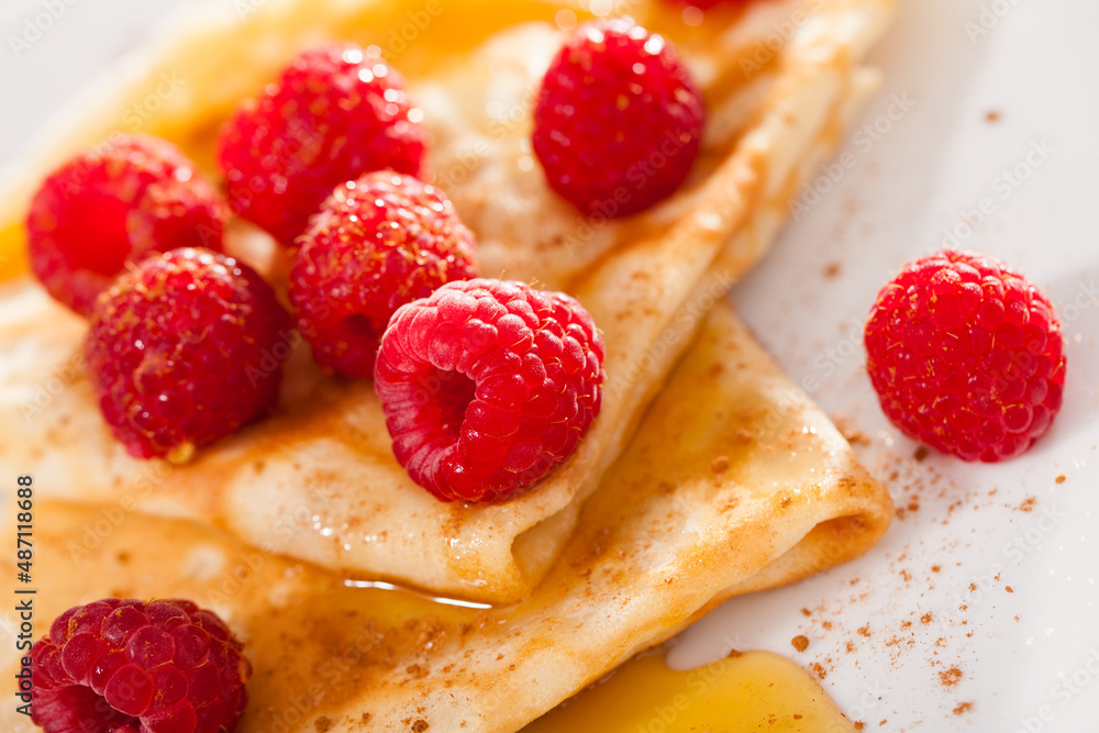 delicious pancakes with fresh raspberries and honey delicious pancakes with fresh raspberries and honey