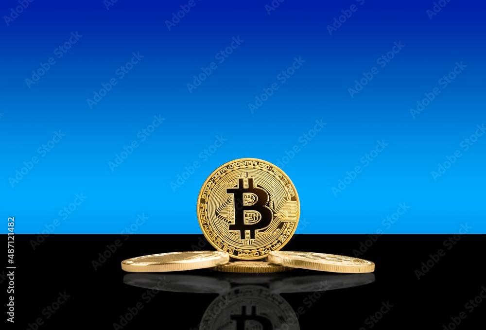 Golden Bitcoin coins. cryptocurrency concept Golden Bitcoin coins. cryptocurrency concept