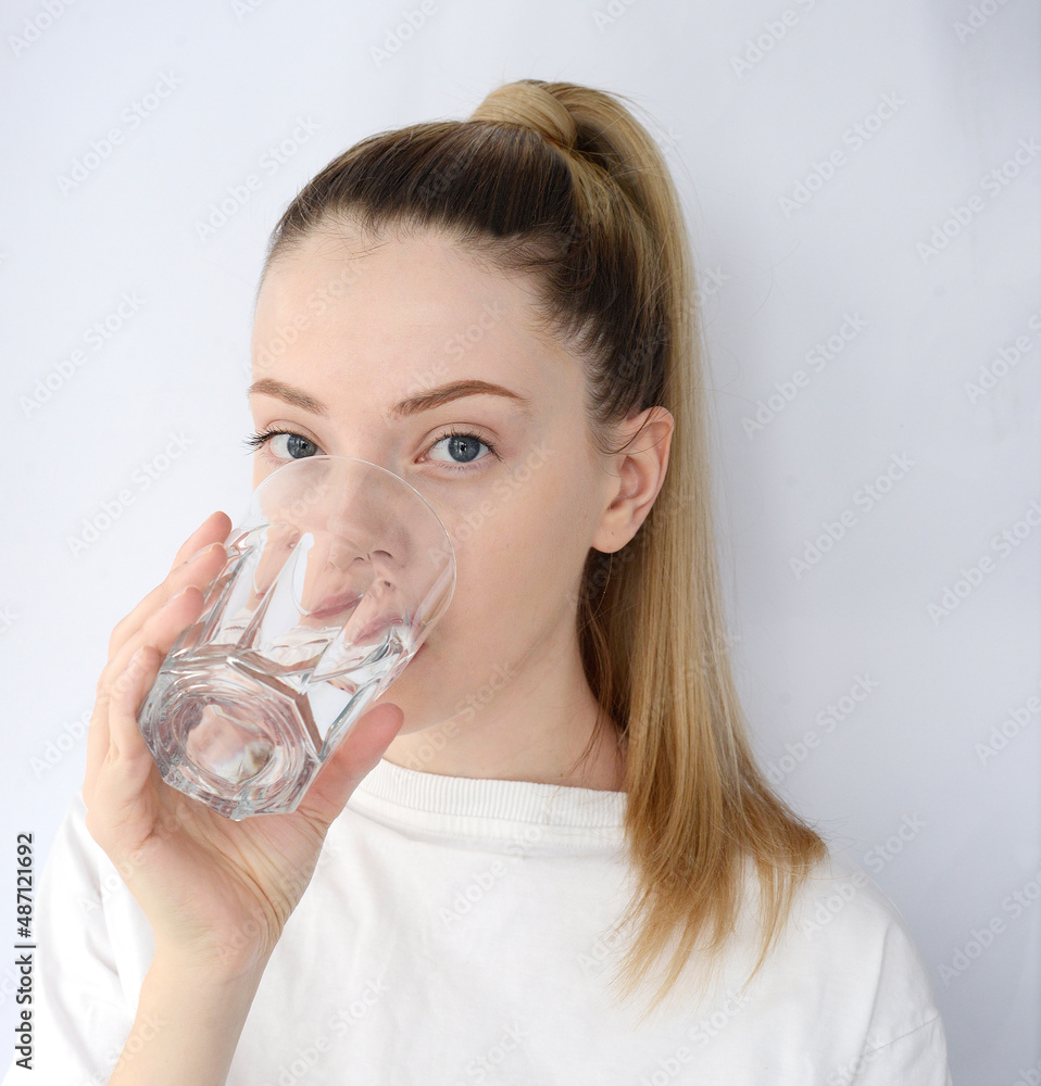 young pretty woman drinks water young pretty woman drinks water