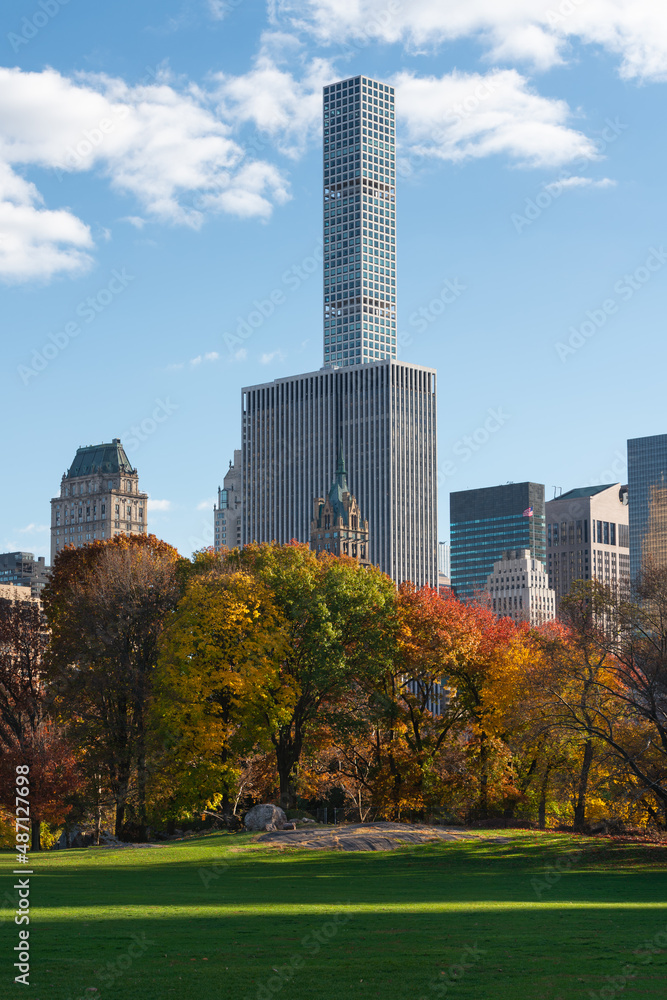 Fototapeta premium New York City Upper East Side skyscrapers from Central Park Sheep Meadow in Autumn. Manhattan luxury building towers