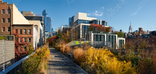 New York City panoramic view of the High Line promenade in Autumn with Hudson yards skyscrapers. Chelsea, Manhattan