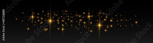 Yellow dust sparks, golden stars, bokeh gold light