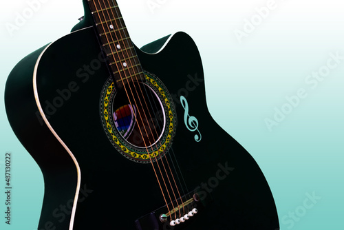 Guitar, Black acoustic guitar isolated on gradient background.