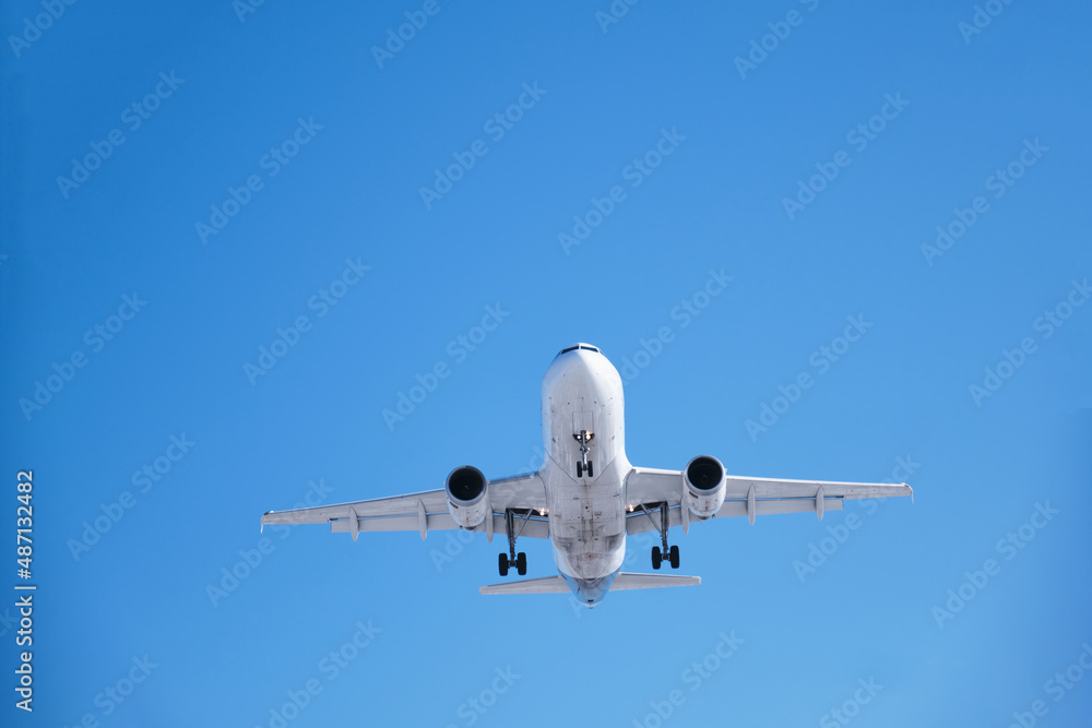 Close up of airplane in the blue sky