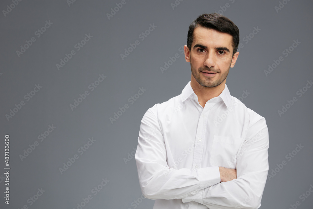 handsome businessman in a white shirt a pensive look business and office concept handsome businessman in a white shirt a pensive look business and office concept